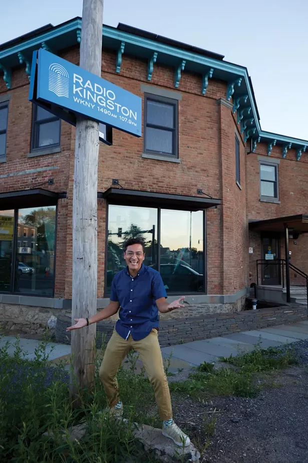 Manuel Blas, host of Radio Kingston’s alt-Latin show, “La Dosis Perfecta,” outside the station’s new studios on Broadway. - DAVID MCINTYRE