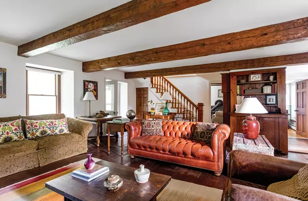 The interior of the home is lined with the original wide plank wooden floors and ceiling beams. “When we first arrive at a place, we consider how it originally was built,” says Voglino, who was born in Sardinia but grew up in Rome. “We don’t intend to knock things down. We want to make things functional and beautiful but we also want to save the original spirit of a place. That’s been our mission in life.” - WINONA BARTON-BALLENTINE