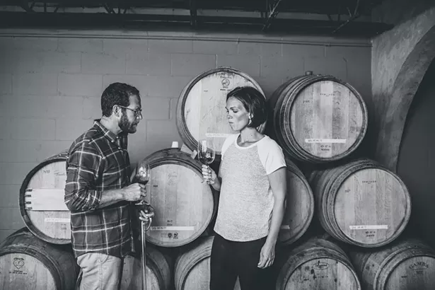 Matt Spaccarelli and Casey Erdmann of Milton-based Fjord Vineyards in the winery’s cellar.