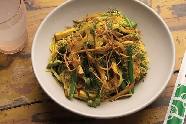 Morningbird’s stir-fried turmeric rice noodles with bok choy, mushrooms, and dill.
