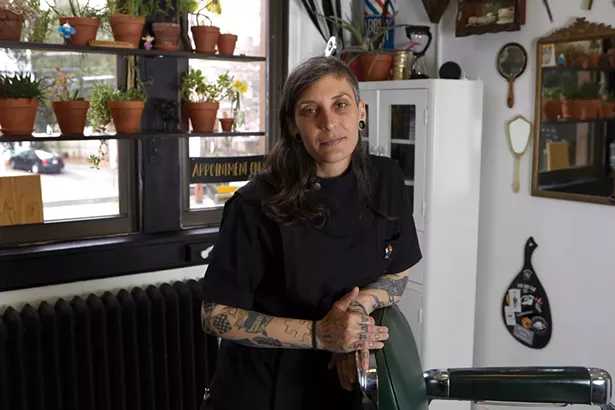 Lucky Longo in their hair-cutting studio at the former Beacon High School. - DAVID MCINTYRE