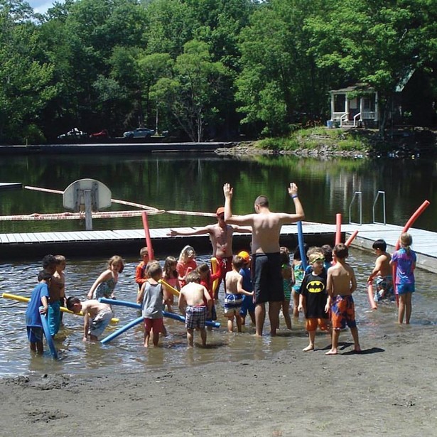 Kids play in the water at Camp Seewackamano. - WINONA BARTON-BALLENTINE