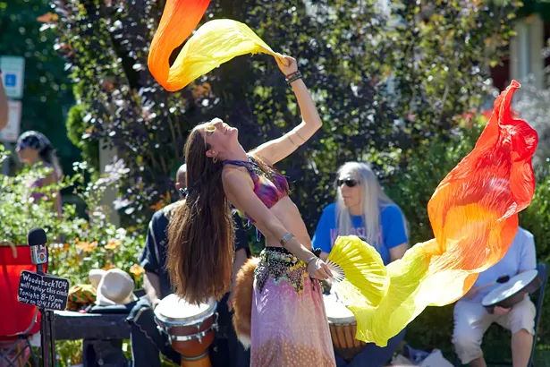 A dancer at the weekly Sunday drum circle. - DAVID MCINTYRE