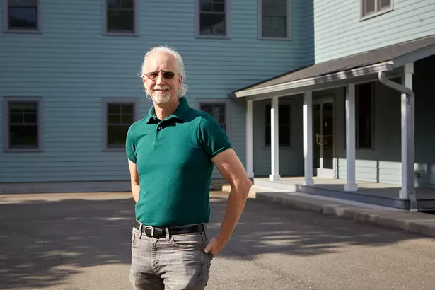 Library Board President Jeff Collins outside the future home of the library at 10 Dixon Avenue in Bearsville. - DAVID MCINTYRE