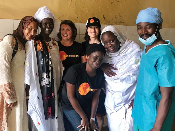 Maggie Carpenter (third from left) with fellow doctors and midwives at a hospital in St. Louis, Senegal.