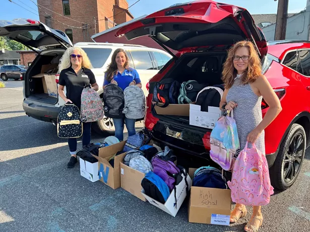 MHV staff members supporting the Back to School Backpack Drive for People's Place