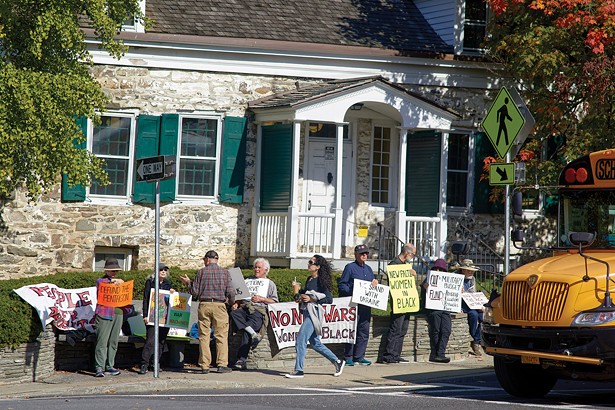 Protesters on Main Street in New Paltz. - DAVID MCINTYRE