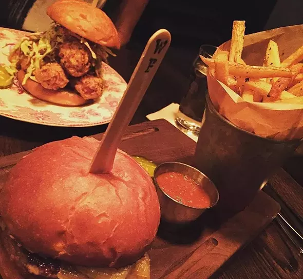 Chef Kirby Farmer elevates familiar staples, like the Cast Iron Bar Burger with hand-cut fries and a housemade tomato relish.