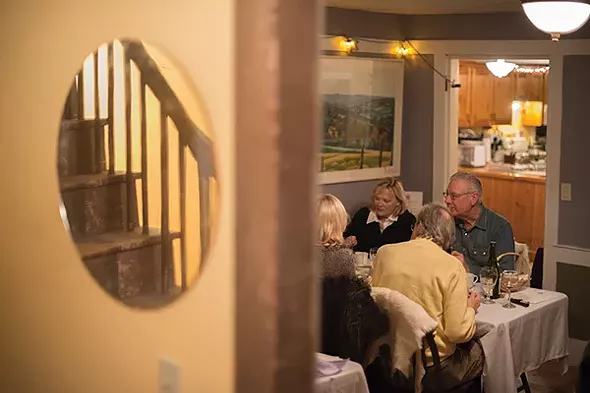 The small, cozy dining room at Heather Ridge Farm - JIM MAXIMOWICZ