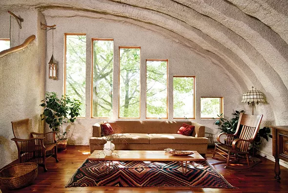 The serene and sunny living area on the upper level of the house. "Our human made world is very jarring and we are continually contrasting one thing with the other and isolating territories—it's like a chopping block all the time. Even our time is so regulated. We wanted to provide people with a kind of emblem of an alternative. - DEBORAH DEGRAFFENREID