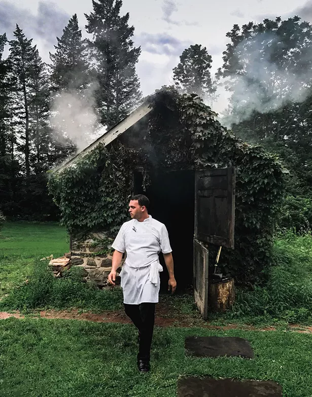 Chef Aaron Abramson leaving the smokehouse.