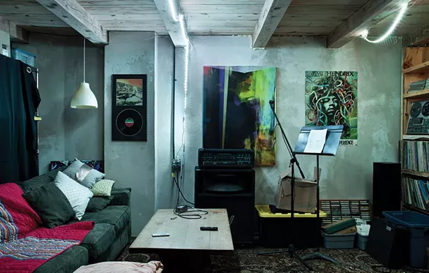 The home’s original basement now serves as a sort of mancave for Marko. Heated by radiant floor heating, the space is decorated with some of his work and memorabilia and also serves as the “final resting place” for his extensive record selection. - DEBORAH DEGRAFFENREID