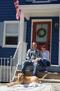 Luke and Catherine Hilpert, and Hank, on their front stoop on Main Street in Cold Spring. - JOHN GARAY