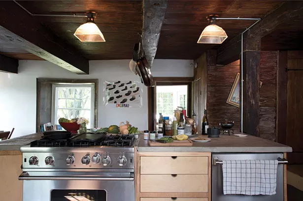 Zeller enlarged the downstairs kitchen by removing walls and then added stainless steel appliances and an island. Although she spent many years in the fashion industry, cooking has always been a passion. - DEBORAH DEGRAFFENREID