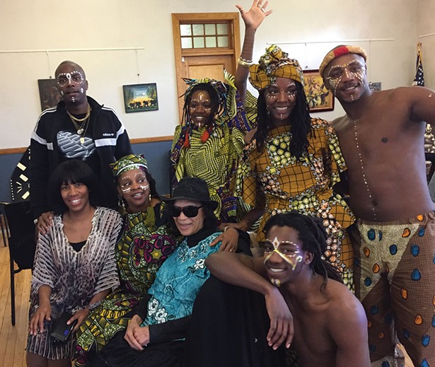 The Badilla family—Milandou, Nkoula, Ntangou, Ntchota, Ngounga, Mounnanou, and Pamela— with Gloria Stewart and Debbie Waithe at the Hudson Area Library.