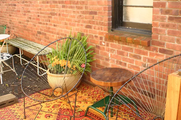 The long alley-like patio offers ample seating for warm weather days. - MARIE DOYON