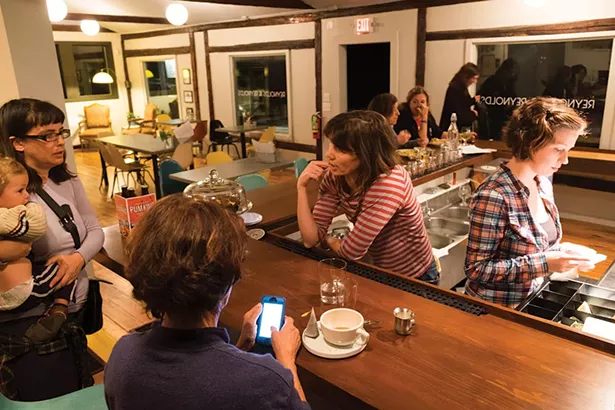Owner Megan Reynolds talks with customers across the bar.