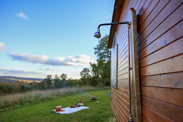 If there is no pond or snowbank where the sauna is set up, the Cloudberry comes with a shower head that can be mounted to outside and hooked up to a garden hose. - NILS SCHLEBUSCH (NILS360.COM)