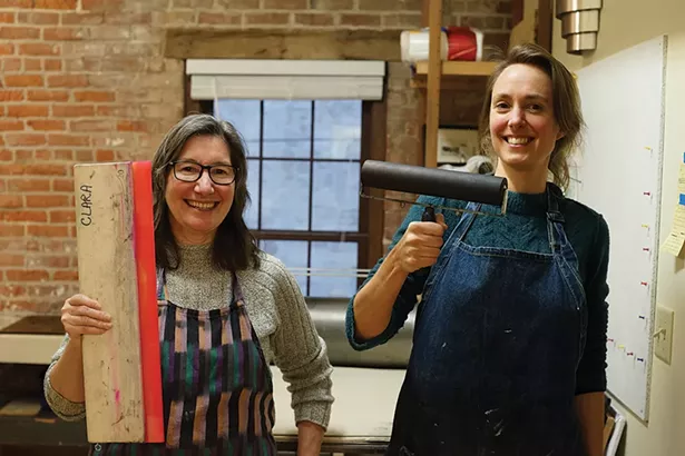 Anita Fina Kiewra, studio manager, and Emilie Houssart, studio assistant at PUF Print Studios at the Underwear Factory. - PHOTO BY JOHN GARAY
