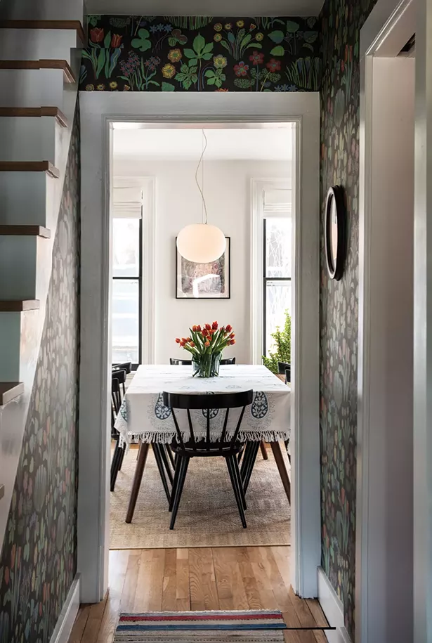 A view to the home’s dining table, adorned with flowers. In 2016, Walker joined with flower farmer Marina Michahelles to form the nonprofit Abloom, which specializes in flower recovery. Along with a group of volunteers, the two gather flowers after weddings and other events, retrim the stems, and then distribute the still fresh, seasonal flowers to women’s shelters and other institutional living spaces throughout the Hudson Valley. “It’s a very straightforward, noncontroversial thing - to give people flowers. What’s not to love? Everyone deserves some beauty,” explains Walker. “What we didn’t realize was how powerful it was going to be for people to have something beautiful in their rooms. It reminds them of their value as humans.” - PHOTO: DEBORAH DEGRAFFENREID