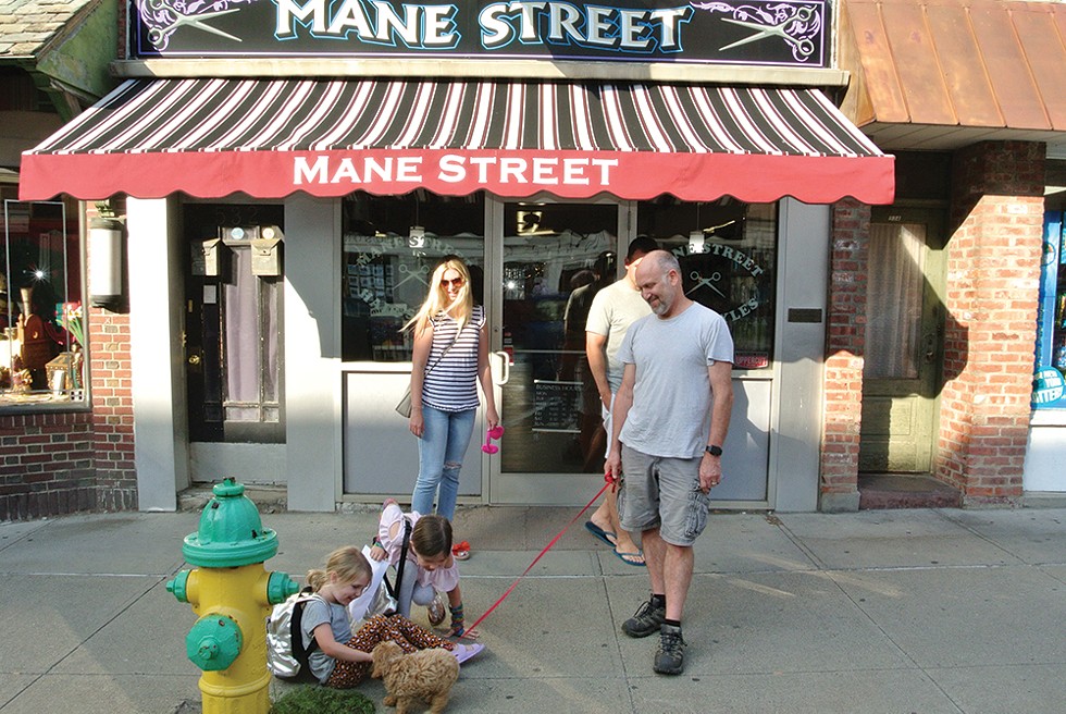 Johnny, Caitlyn, Hazel, Violet, Oliver, and Peanut in front of Mane Street on Warren Street in Hudson. - PHOTO: JOHN GARAY