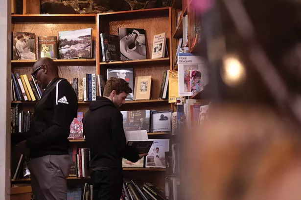 Les Jones and Simeon Tuttle at Inquiring Minds Bookstore. - PHOTO: ROY GUMPEL