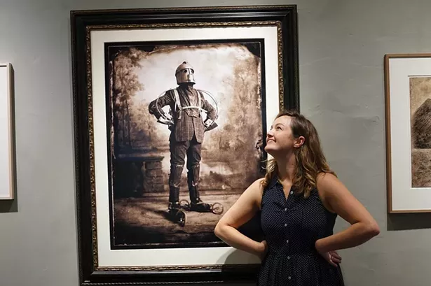 Linden Scheff poses with Nick Simpson’s The Perambulator at Carrie Haddad Gallery in Hudson. - PHOTO BY JOHN GARAY