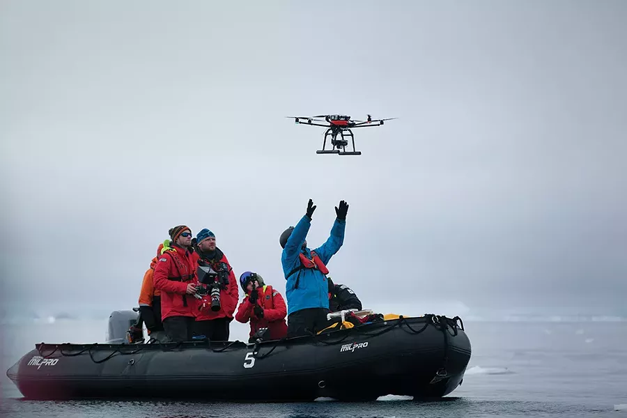 From acoustic monitoring to crossbow biopsies, researchers from UC-Santa Cruz use a variety of technologies to document how marine mammals are impacted by climate change. To study whale populations, the team often employs a custom-designed drone featuring photogrammetry equipment allowing them to study the health of animals from the air. - PHOTO BY MADELINE COTTINGHAM