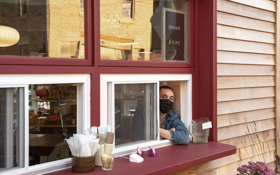 Co-owner Anna Morris at Kitty's takeout window. - SABRINA EBERHARD