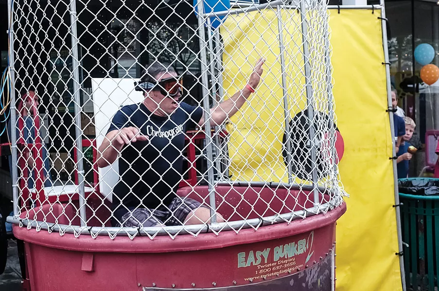 The editor being dunked in 2013. He is still suffering from dunk tank PTSD. He will not be in the tank at this year’s block party on August 15. - TOM SMITH