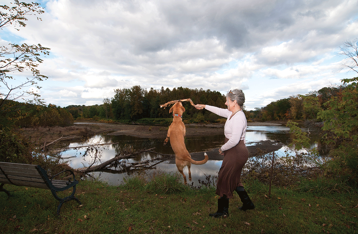 Sasha Chermayeff and Chai Wallah by the Catskill Creek in the backyard. - DEBORAH DEGRAFFENREID