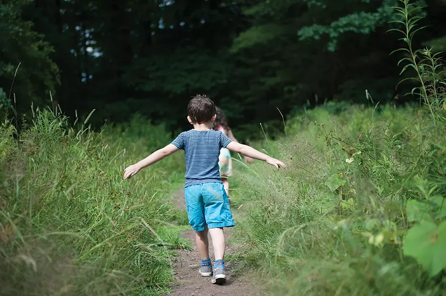 Children enjoy walking in nature. - HILLARY HARVEY