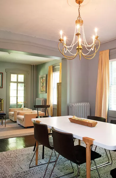 The home's sitting and dining rooms. Sexton painted all the floors by hand, crawling through the house with a two-wedge paint brush. - DEBORAH DEGRAFFENREID