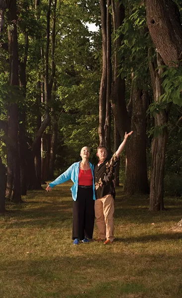 Irene O'Garden and John Pielmeier amongst the trees of "Windway." - DEBORAH DEGRAFFENREID