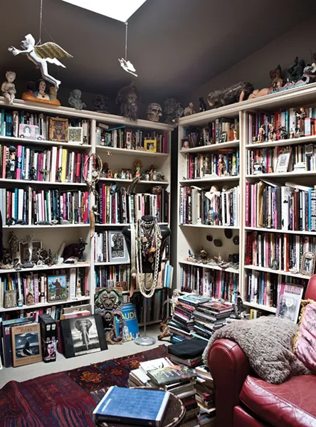 Castellarian's library and painting studio is one of the home's many rooms lit from above and bursting with artifacts of two lives, artfully lived. - DEBORAH DEGRAFFENREID