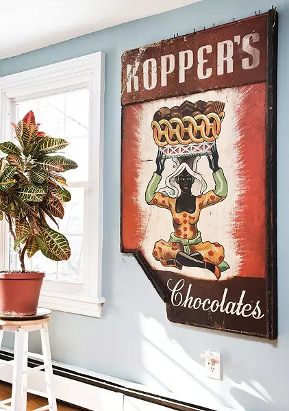An antique wooden sign in the Palaia/D'Ambra home. - DEBORAH DEGRAFFENREID