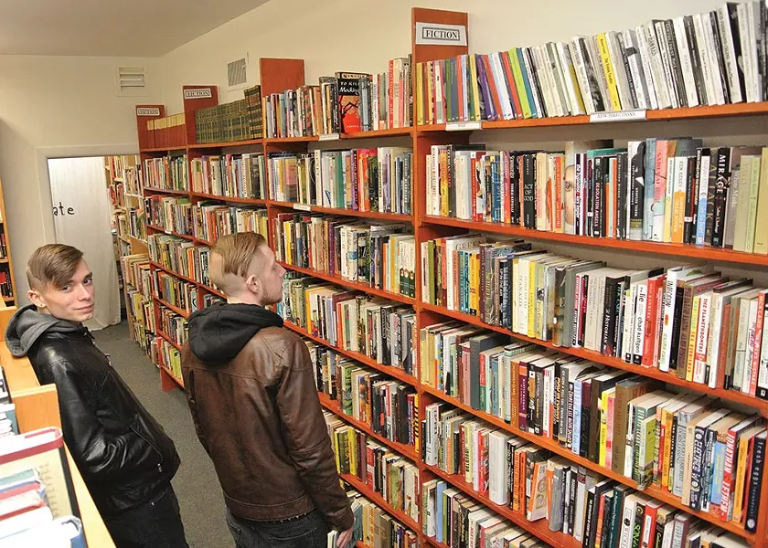 Connor Brainard and friend at Half Moon Books. - JOHN GARAY