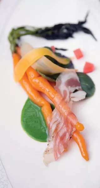 Sauteed young carrots with lamb pancetta, spinach-watercress puree, and pickled carrots and watermelon radish. - PETER BARRETT