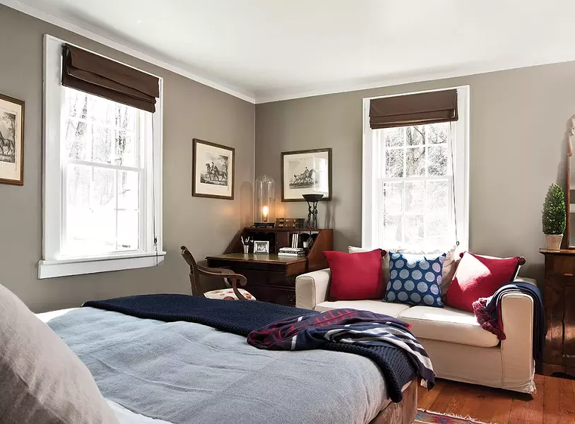 An alpaca fur bedspread and pillows also adorn the downstairs guest bedroom. "At trade shows, I love taking buyers by the hand and saying 'Here, touch this,'" Alicia Adams explains. "They always say, 'Oh, it's cashmere,' and I say, 'No—it's alpaca,'" - DEBORAH DEGRAFFENREID