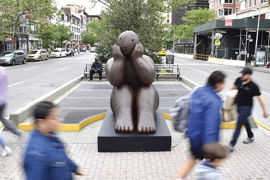Sitter with head in hands, a bronze by Joy Brown in Manhattan, part of the exhibit “Joy Brown on Broadway.”