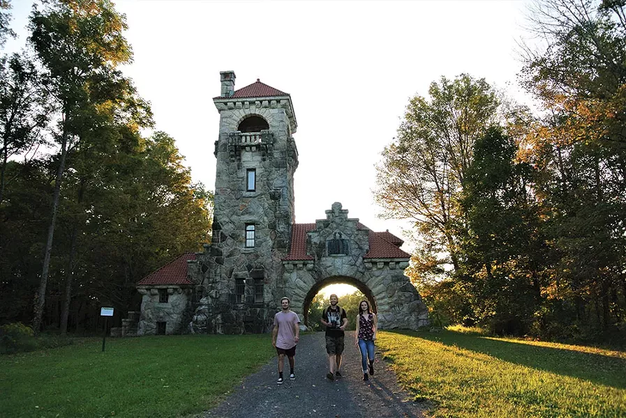Howie Birch, Tyler Koester, and Grace Birch at the Testimonial Gatehouse on the Mohonk Preserve. - JOHN GARAY