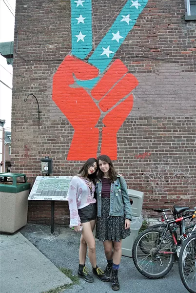 SUNY New Paltz students Jade Mogavero and Lily Lavender Wolf just off of Main Street in New Paltz. - JOHN GARAY