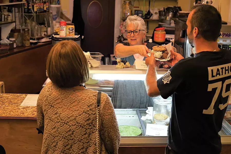 Charles and Sara, patrons of Huguenot Creamery, with Creamery owner Pat Walker. - JOHN GARAY