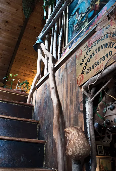 Perrin created a staircase and railings out of branches collected from the surrounding woods. The couple have amassed a storehouse of natural treasures, artifacts, and recycled materials for use in their home’s restoration, their own works or to share with workshop participants. “We have more than enough supplies for all of the Hudson Valley,” Shaftan Perrin explains. - DEBORAH DEGRAFFENREID