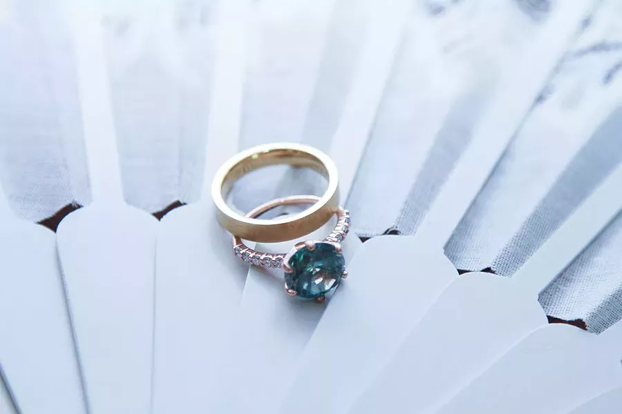 Marie’s engagement ring was designed using the spinel from the Gillett family ring and ethically sourced diamonds, set in rose gold.