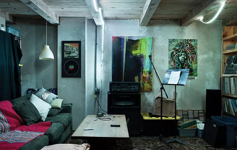 The home’s original basement now serves as a sort of mancave for Marko. Heated by radiant floor heating, the space is decorated with some of his work and memorabilia and also serves as the “final resting place” for his extensive record selection. - DEBORAH DEGRAFFENREID