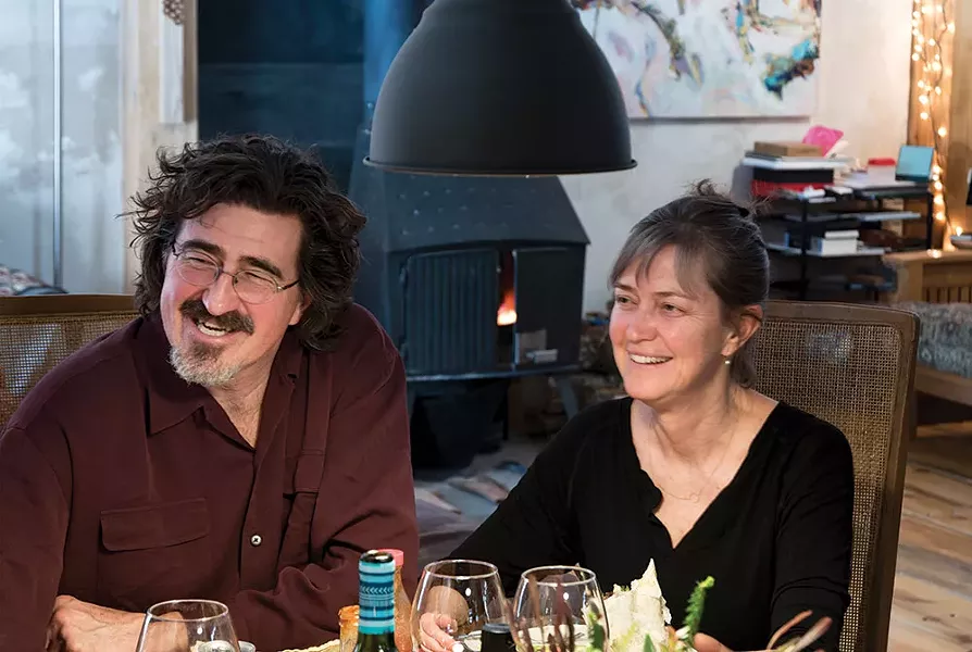 Marko and Motria Shuhan in their living room. Marko Shuhan received help and moral support from a wide range of friends and neighbors while building his home. He credits his wife Motria above all. “She was gracious through the whole thing,” Marko says. “Without her grace and support, I would have fallen apart.” - DEBORAH DEGRAFFENREID