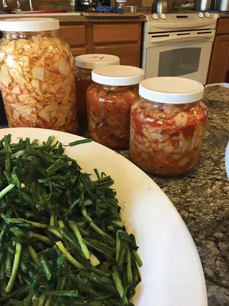 Traditionally, kimchi was stored in stone pots, settled into the ground, but today, ingredients fill glass jars and stay fresh in a dedicated refrigerator. - JOAN MACDONALD