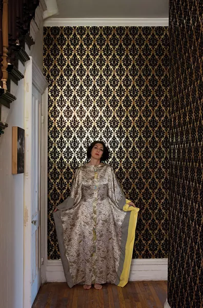 Khorramian wearing one of her silk “kaftoons.” Designed for her clothing company, Laloon, the combination kaftan/kimono is made from three different fabrics and stitched in Catskill. - DEBORAH DEGRAFFENREID