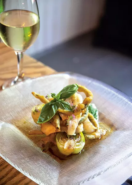 Escolar served with baby bok choy, tempura-fried garlic scapes, wasabi, sesame, and soy, pickled ginger. The garlic scapes are from The Kitchen Garden, the four-acre organic garden co-owned by Chef and Dominique Herman, the produce source for The Grange. - GREG RHEIN